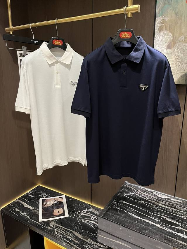 Prad24S夏季男士polo 成衣采用优质丝光珠地棉面料，透气舒适 胸口盾牌字母。。商务休闲皆可胜任，非常协调的点缀 通勤不二的选择！！码数m-3Xl